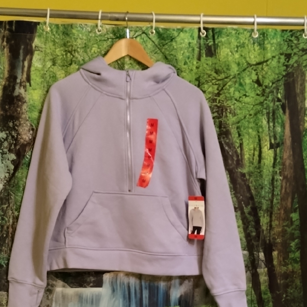 Danskin Lavender Hoodie Jacket. PTP 22 Inch. L also 22.